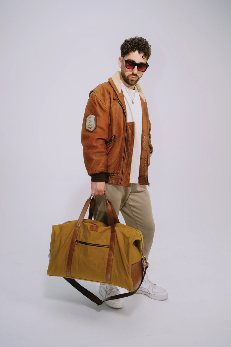 Ochre travel bag designed for airports, road trips and daily journeys