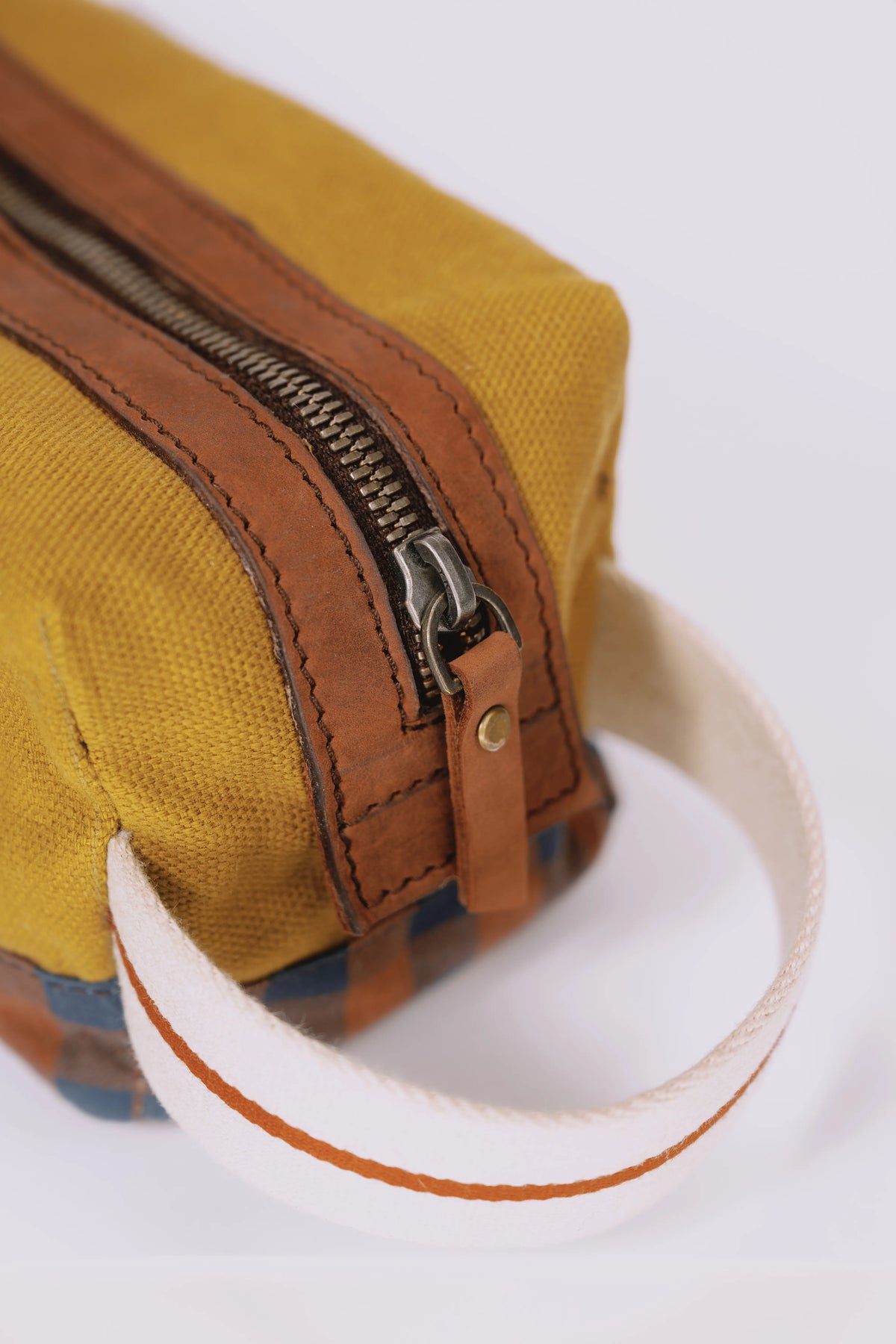 Close-up photo of a yellow travel pouch