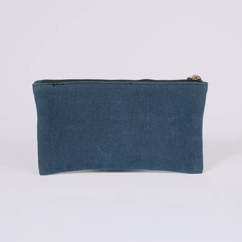 Back of a lightweight canvas essentials pouch The Root Case