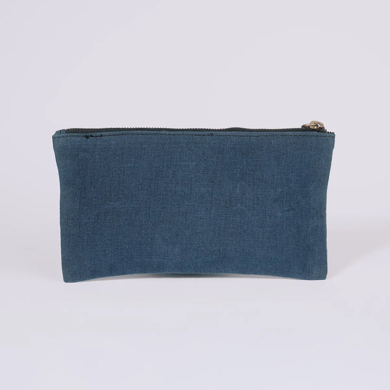 Back of a lightweight canvas essentials pouch The Root Case