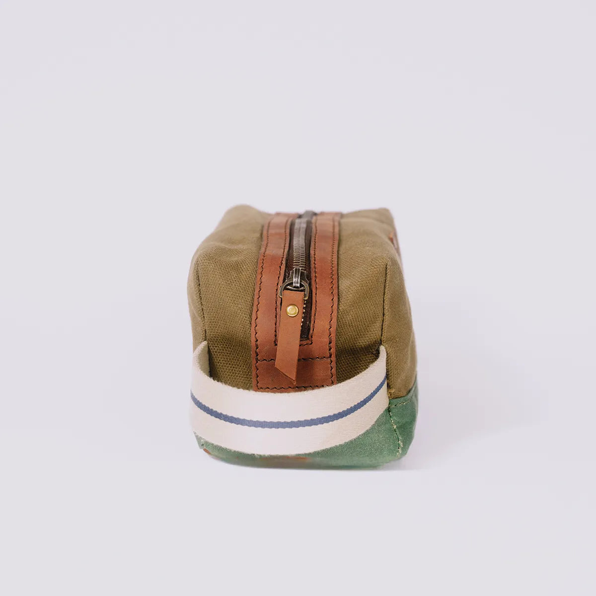 Side of a olive green cosmetics pouch