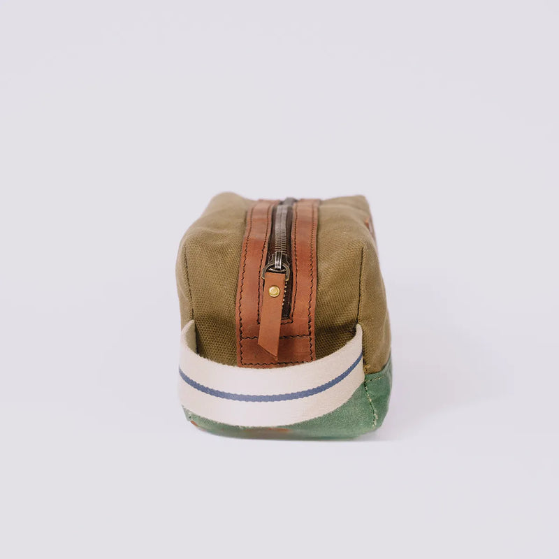 Side of a olive green cosmetics pouch