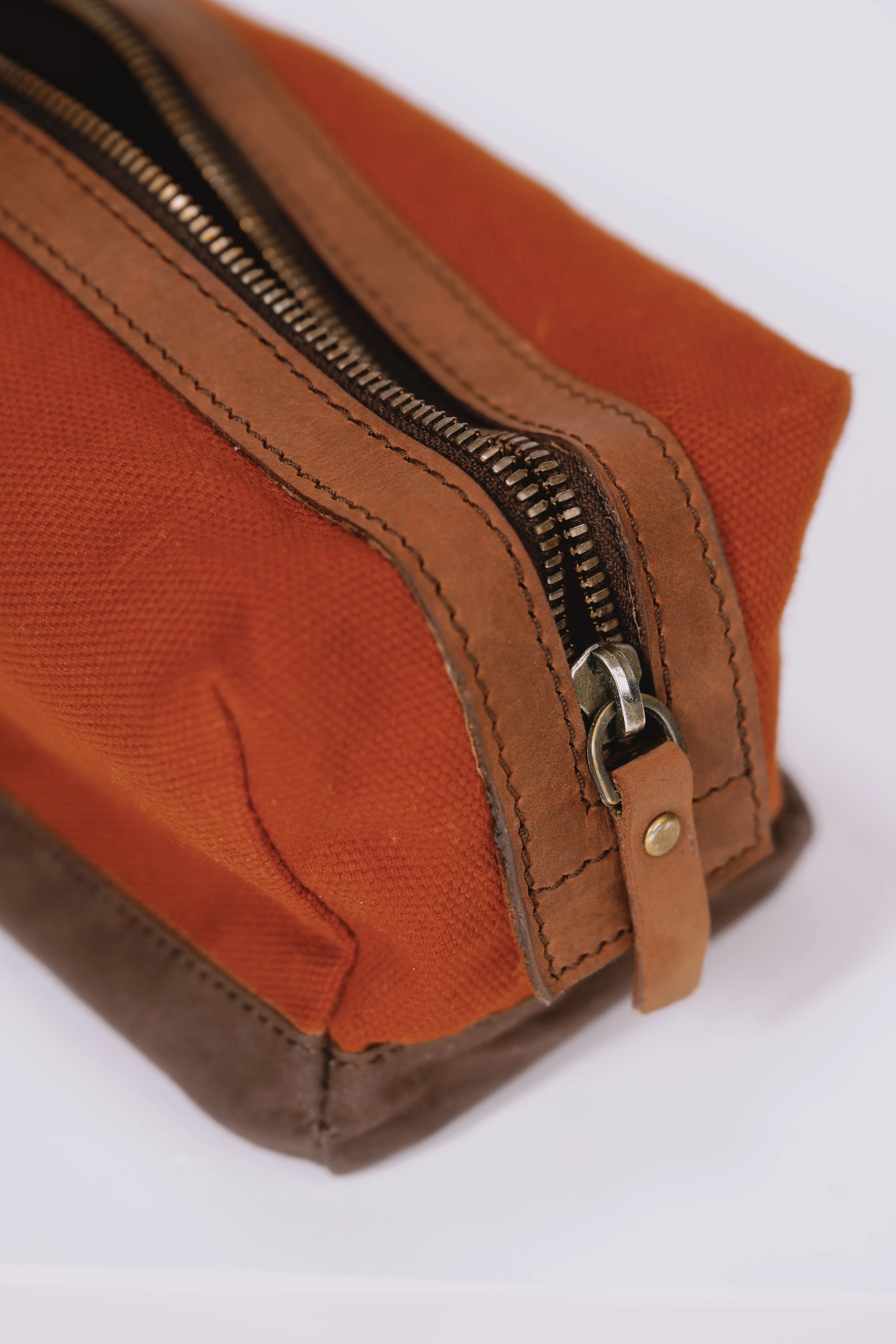 Zipper of a red cosmetic bag